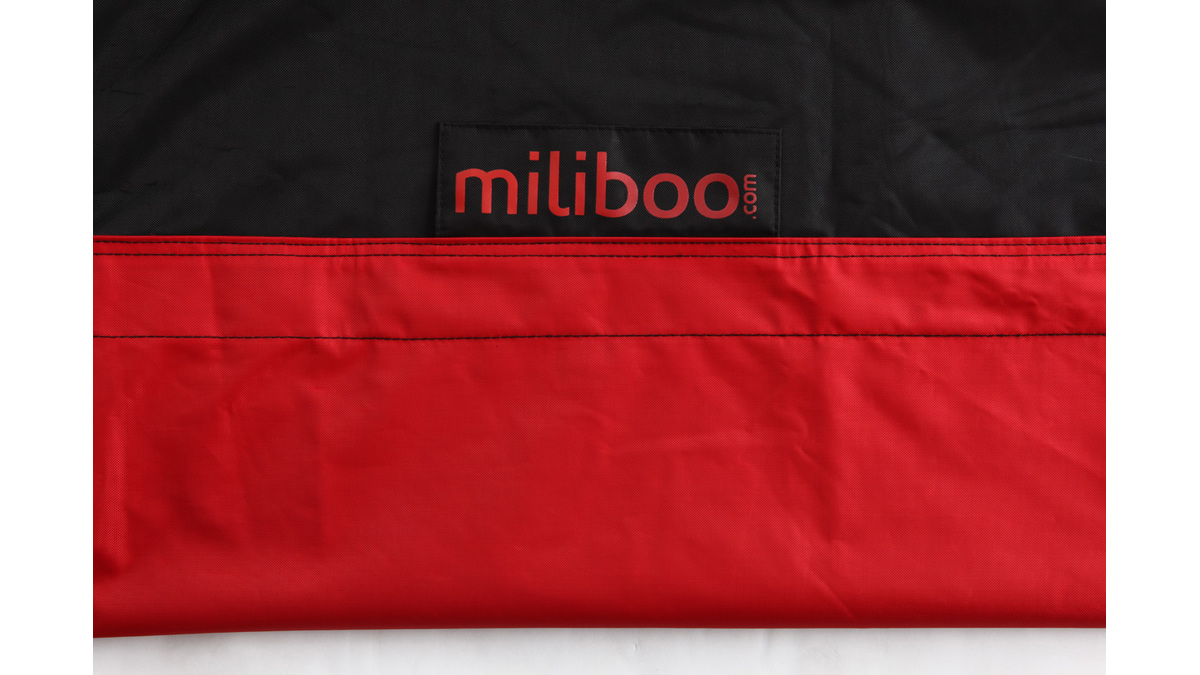 Pouf gant design polyester bicolore noir et rouge BIG MILIBAG