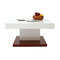 Table basse design laqu&eacute;e blanc et bois plateau ouvrant FUTURA