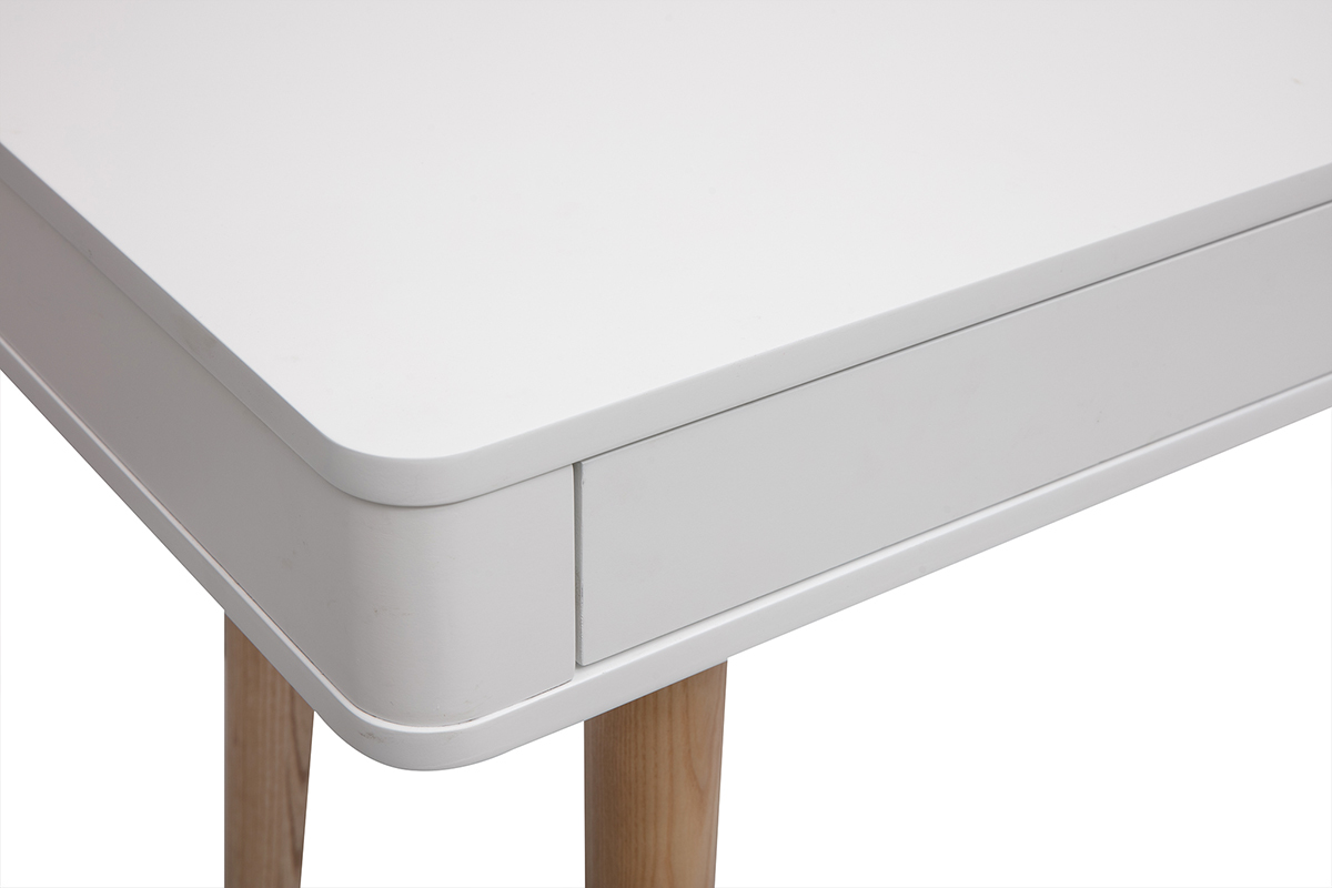 Coin de bureau blanc avec tiroir et pieds en bois clair, vue zoom�e.