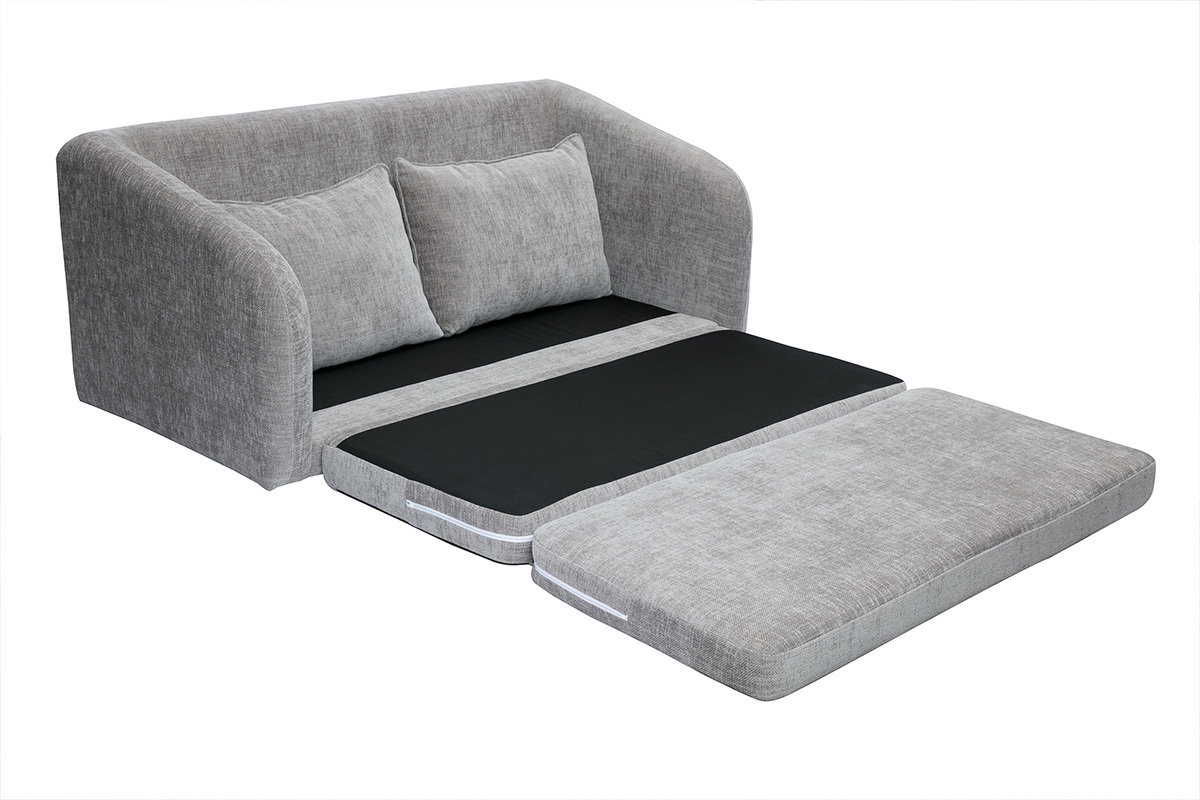Canap convertible gris en tissu effet velours, vue dplie avec coussins.