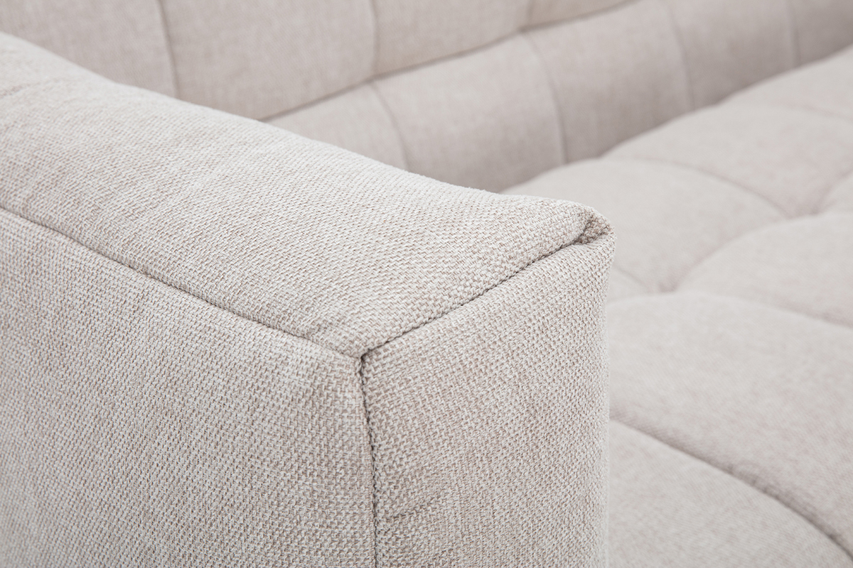 Vue rapproch�e d'un canap� beige en tissu effet velours textur�.