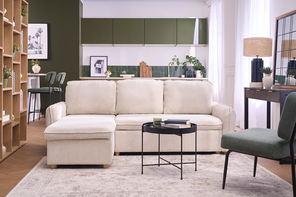 Canap� d'angle beige en tissu velours c�tel�, vue de face, dans un salon moderne.