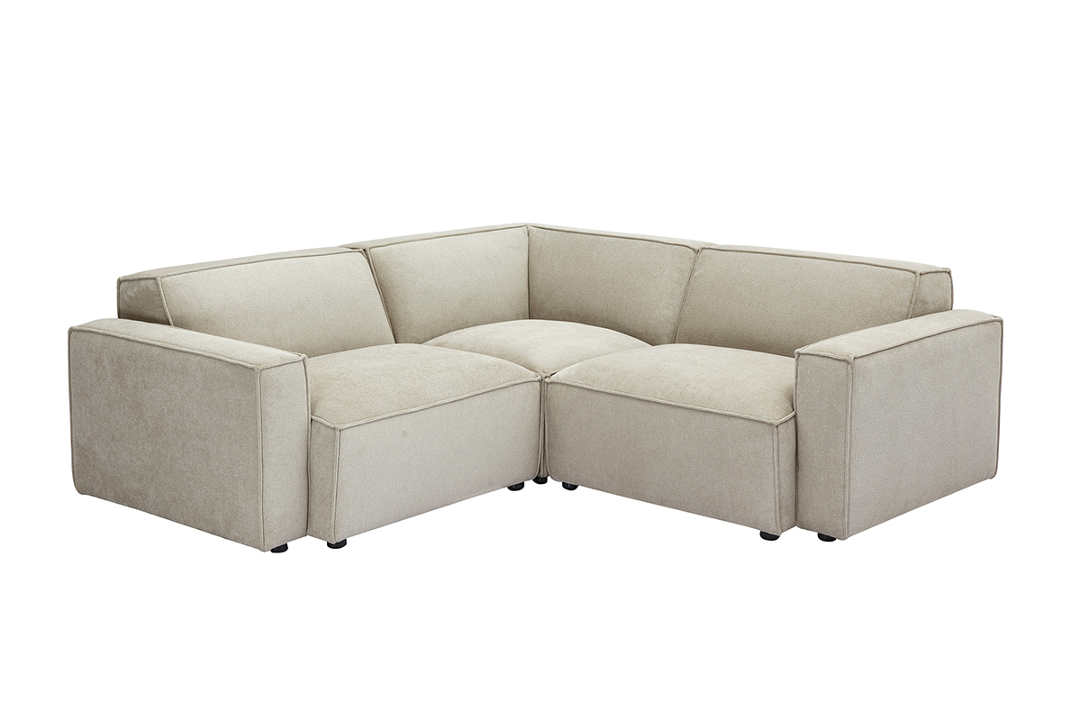 Canap d'angle modulable 3 places en tissu beige, vue de trois-quarts.