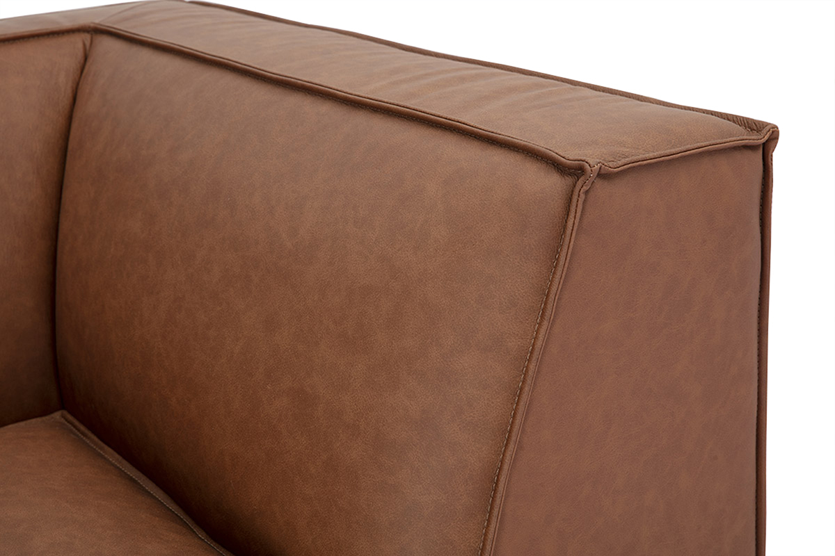 Focus sur canap d'angle modulable vintage en cuir marron
