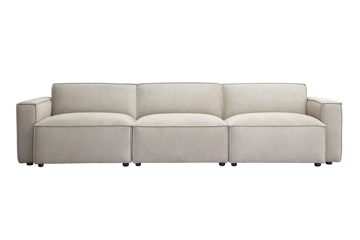 Canap modulable 4 places en tissu effet velours beige, vue de face.
