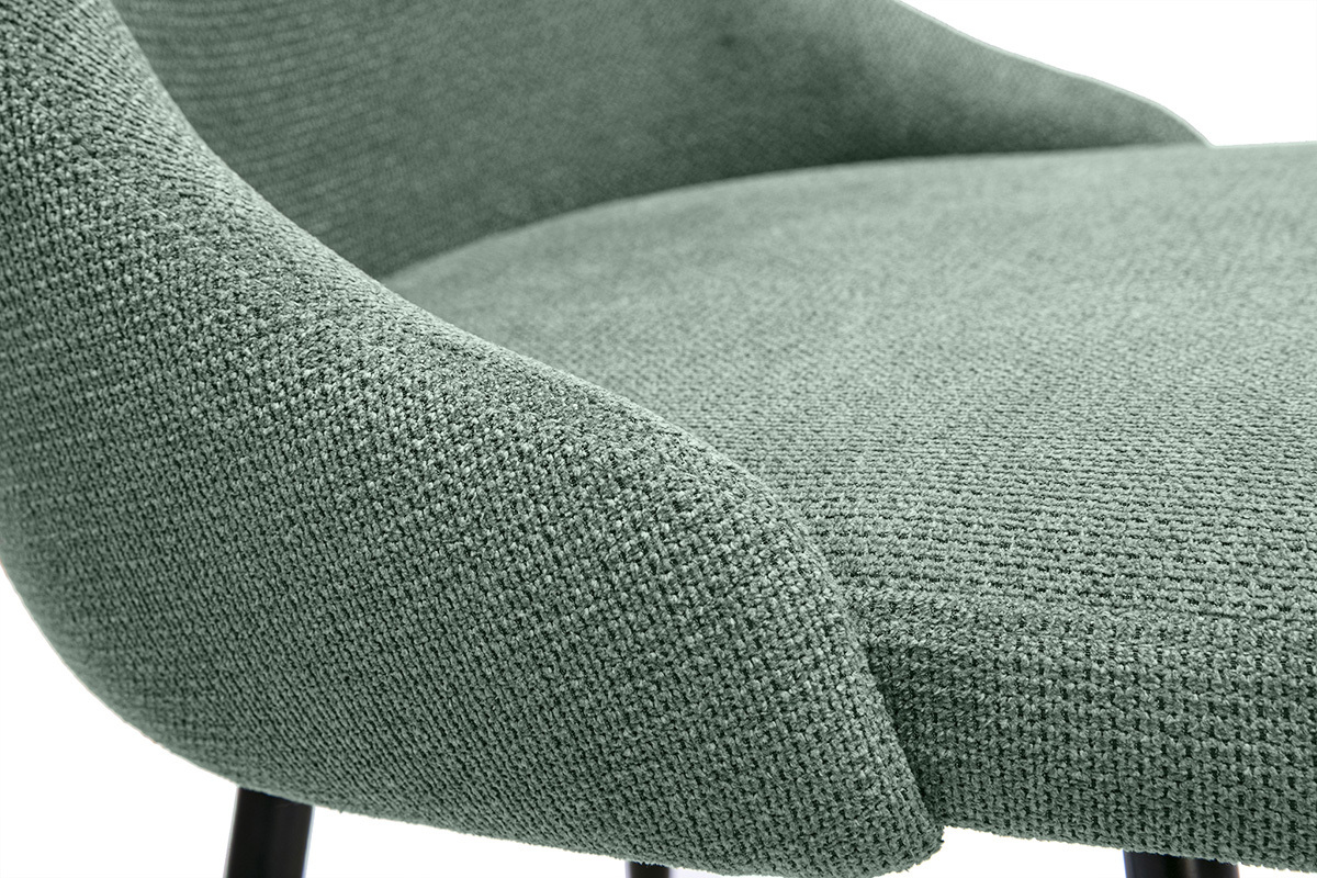 D�tail d'une chaise en tissu chenille vert kaki avec pi�tement m�tal noir, vue de pr�s.