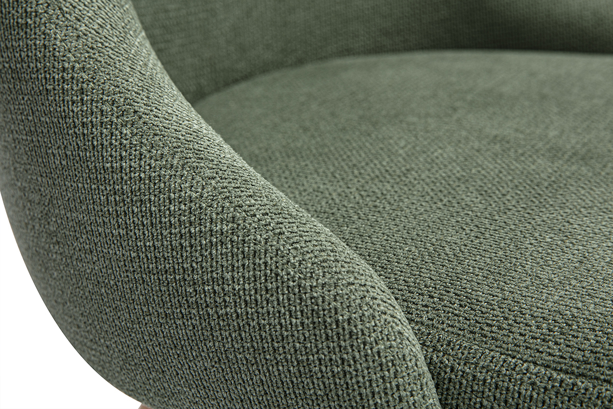 Gros plan sur le tissu chenille textur vert kaki d'une chaise scandinave.