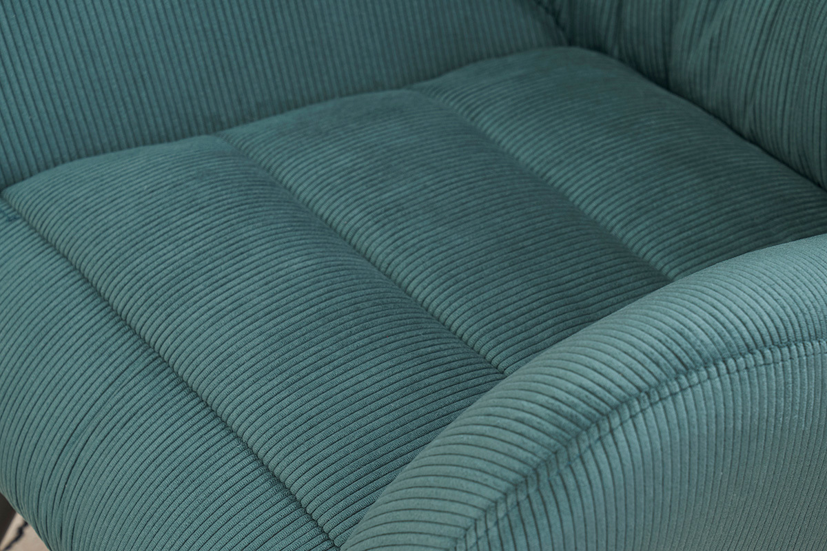 Gros plan sur le tissu velours ctel vert du fauteuil ZOE.