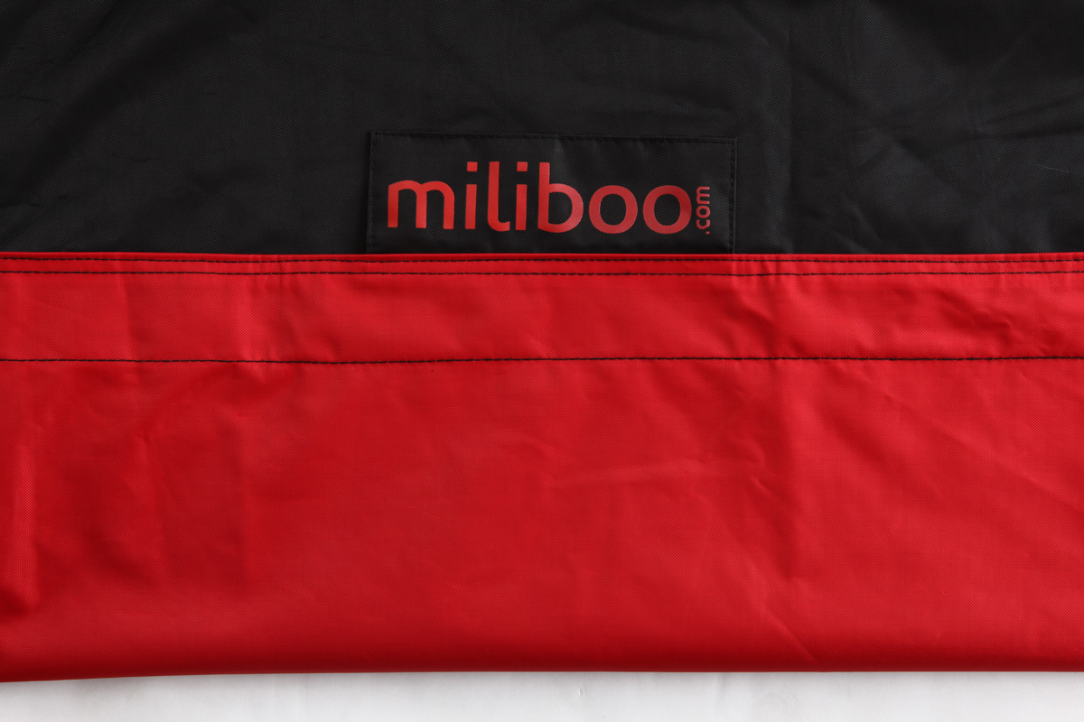 Pouf gant design polyester bicolore noir et rouge BIG MILIBAG