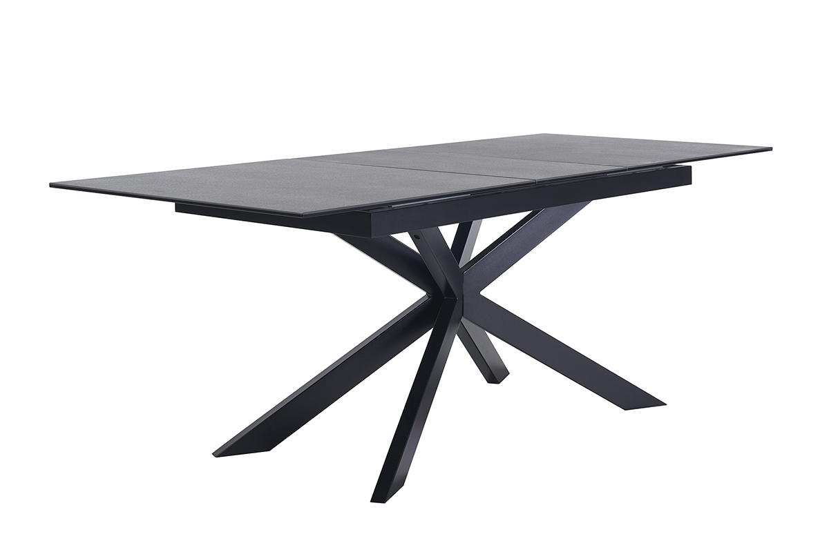 Table � manger extensible en c�ramique noire et m�tal, vue de trois quarts