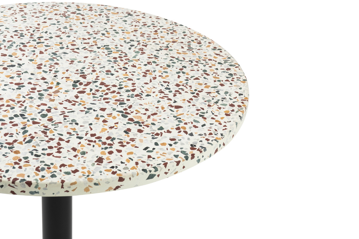 Table ronde en terrazzo avec pi�tement noir, vue de dessus.
