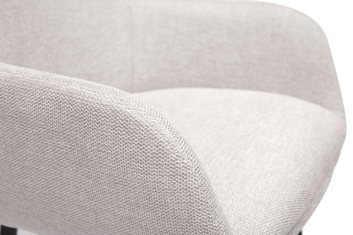 Gros plan d'un tabouret de bar en tissu beige effet velours textur.