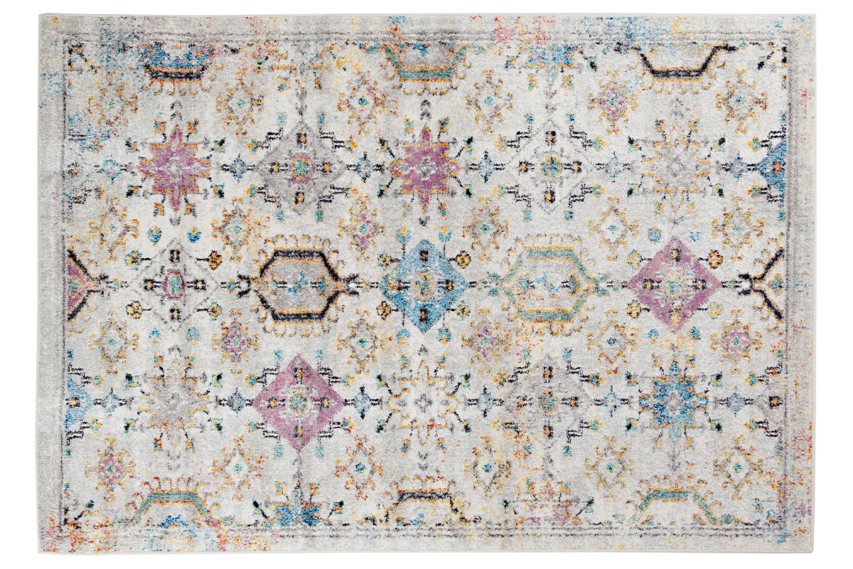 Tapis rectangulaire DULCE multicolore aux motifs g�om�triques et floraux, vue de dessus.