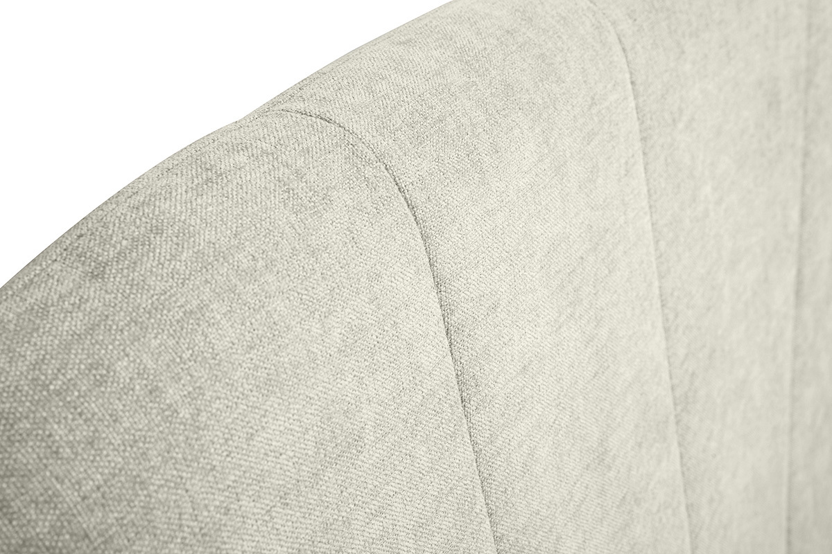 D�tail de la t�te de lit en tissu beige effet velours textur�, vue de 3/4